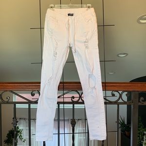 White distressed stretch denim jogger pants